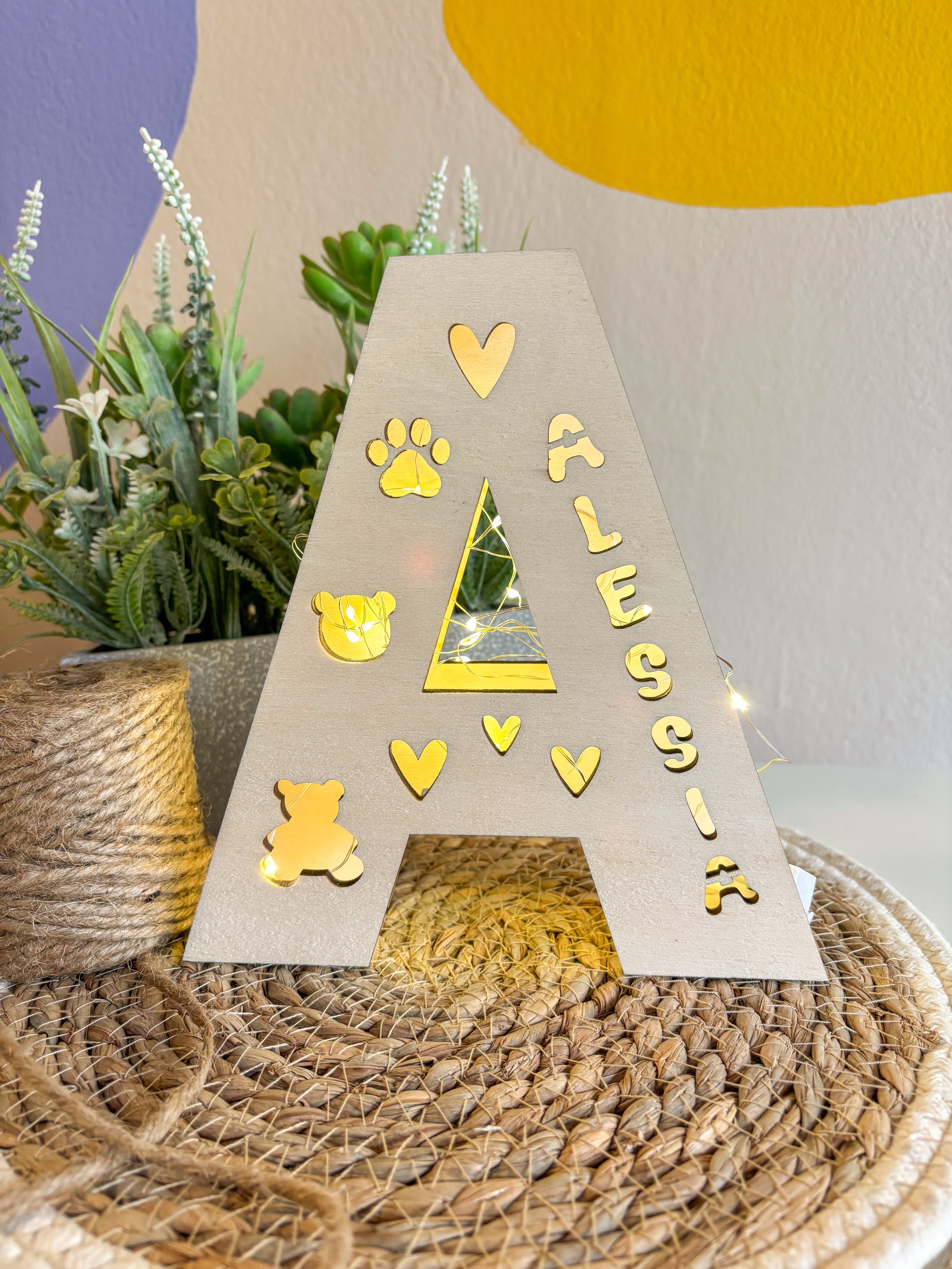 Lampada a forma di lettera